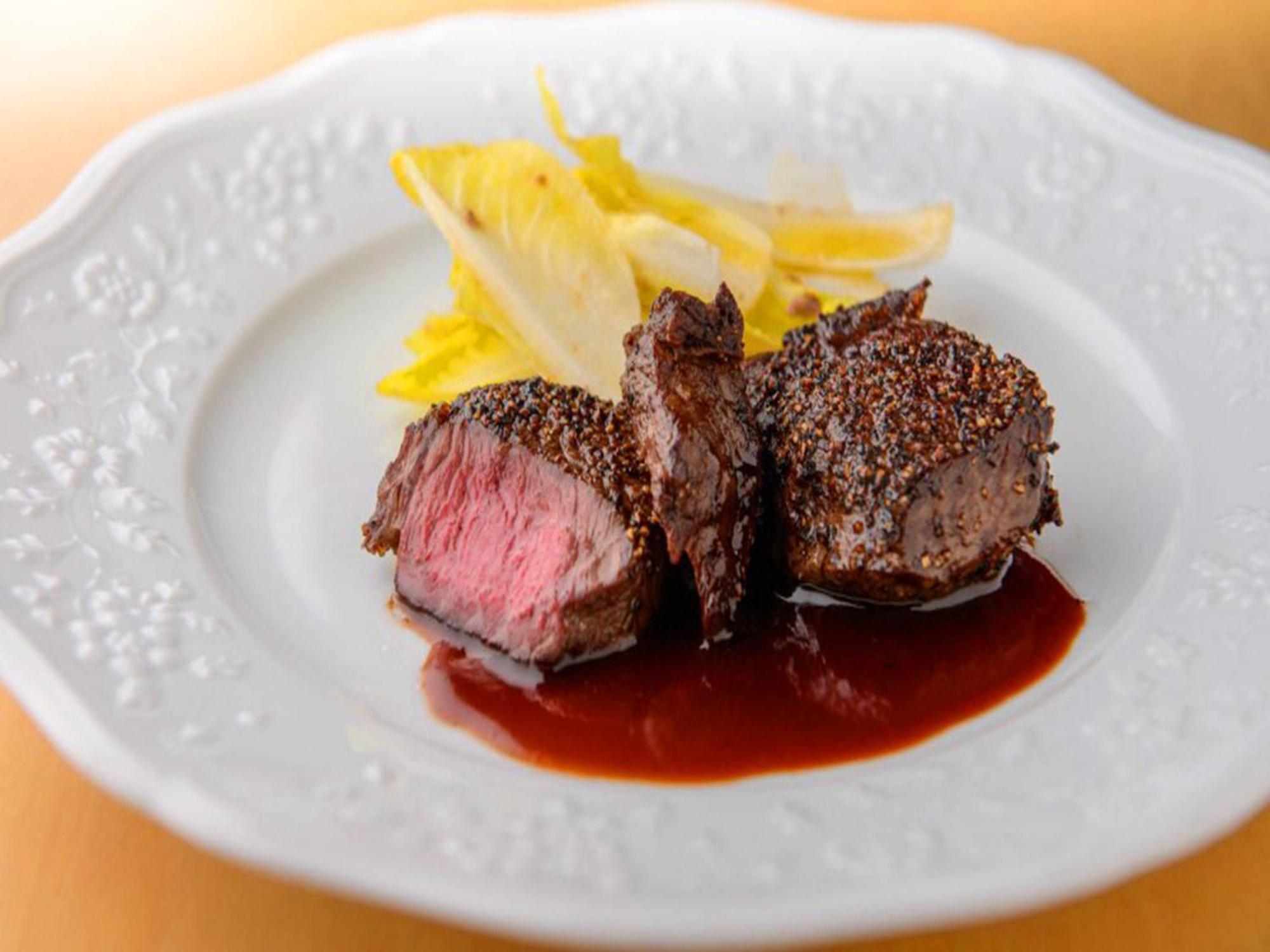 Shin Furano Prince Hotel المظهر الخارجي الصورة A steak prepared using the dry-aging technique